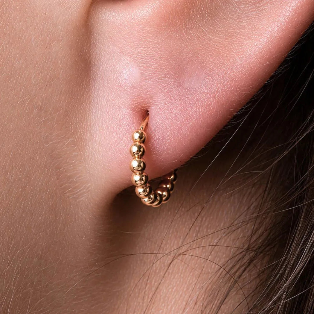 Candongas con relieve ORO 18K