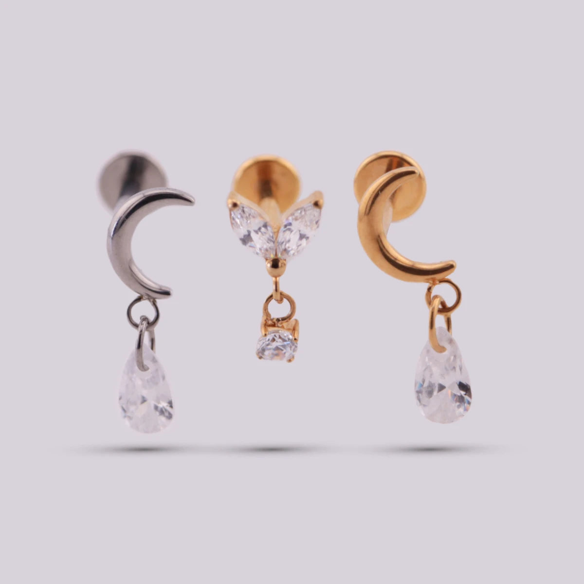 Labret con Dije Pegasi en Titanio – Dorado y Plateado