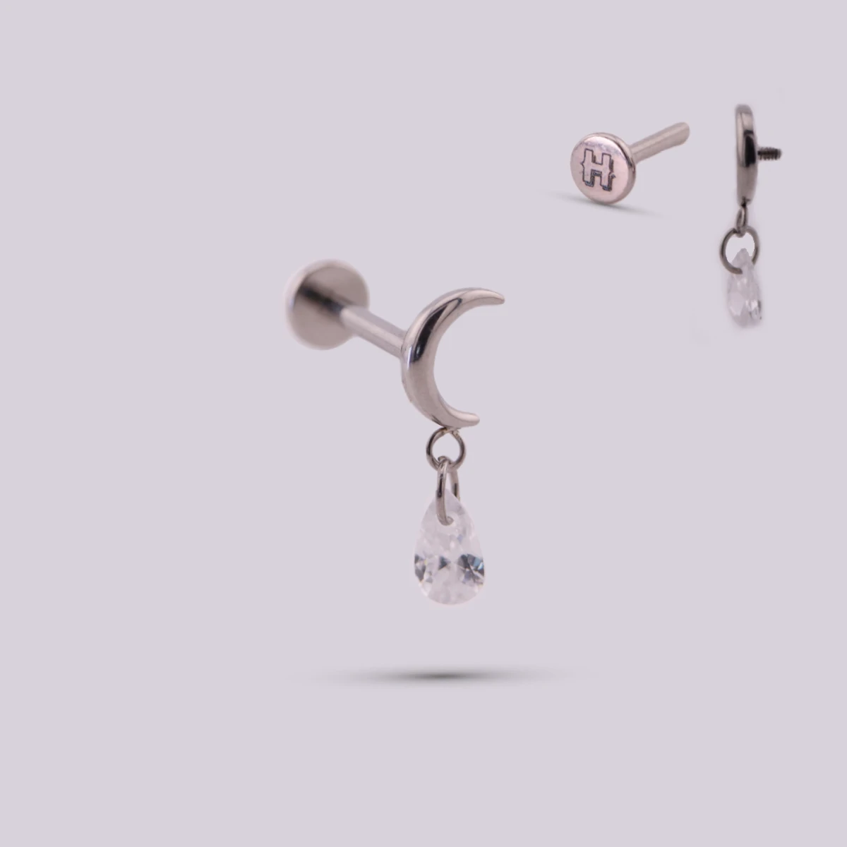 Labret con Dije Pegasi en Titanio – Dorado y Plateado