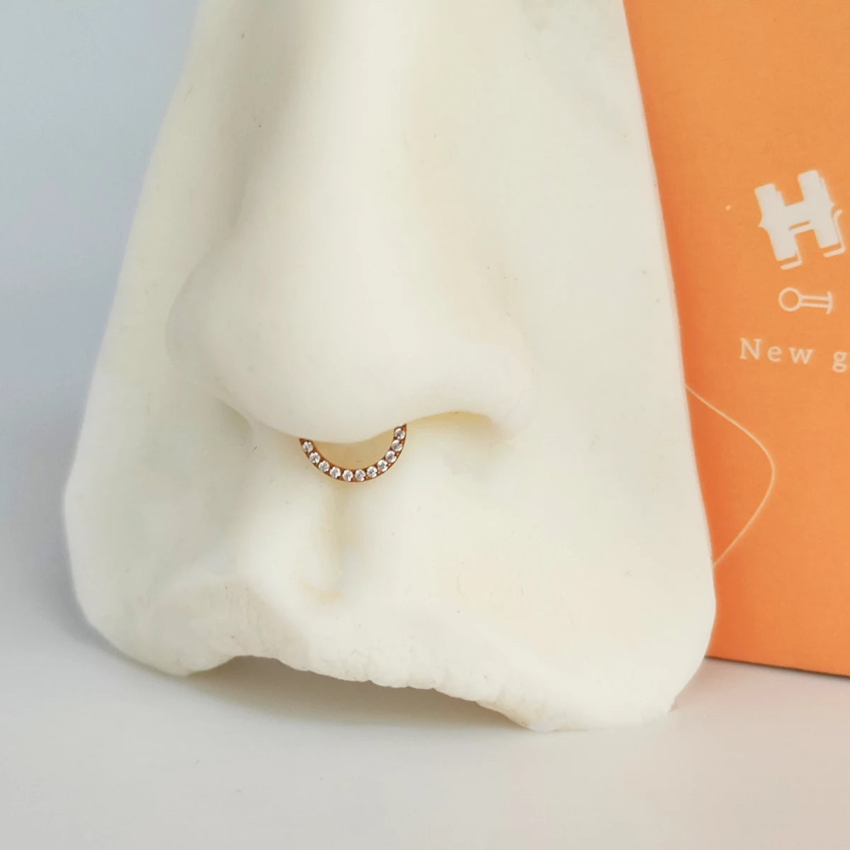 Aro Clicker Frontal Zircon Oro Rosa en Titanio