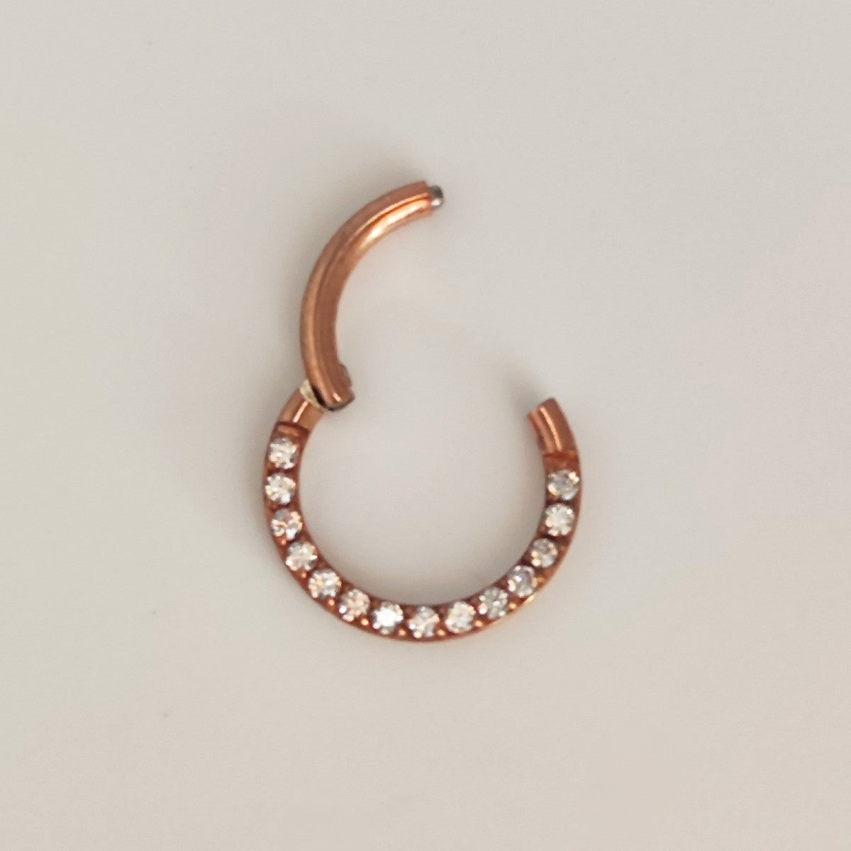 Aro Clicker Frontal Zircon Oro Rosa en Titanio